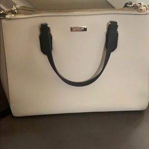 Tan black Kate spade purse. Excellent condition.